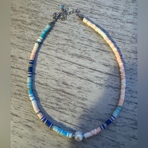 Pearl necklaces with charms